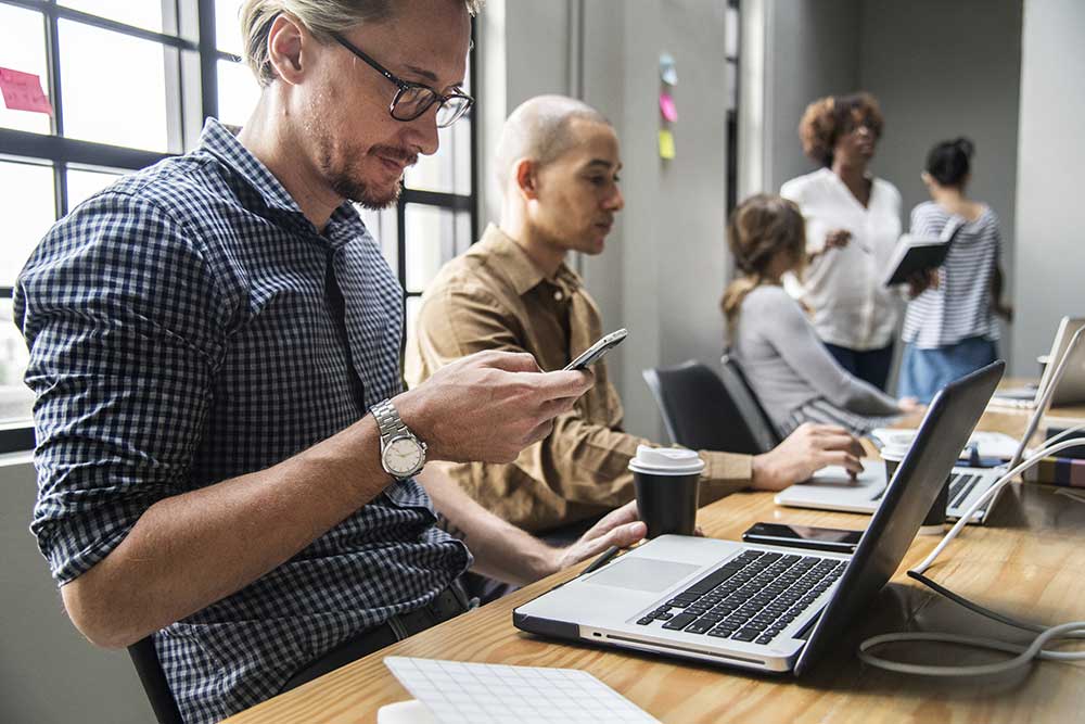 Entrepreneurs sitting at a conference table