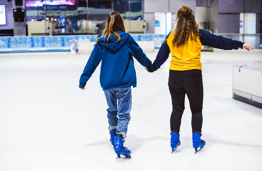 girls ice skating