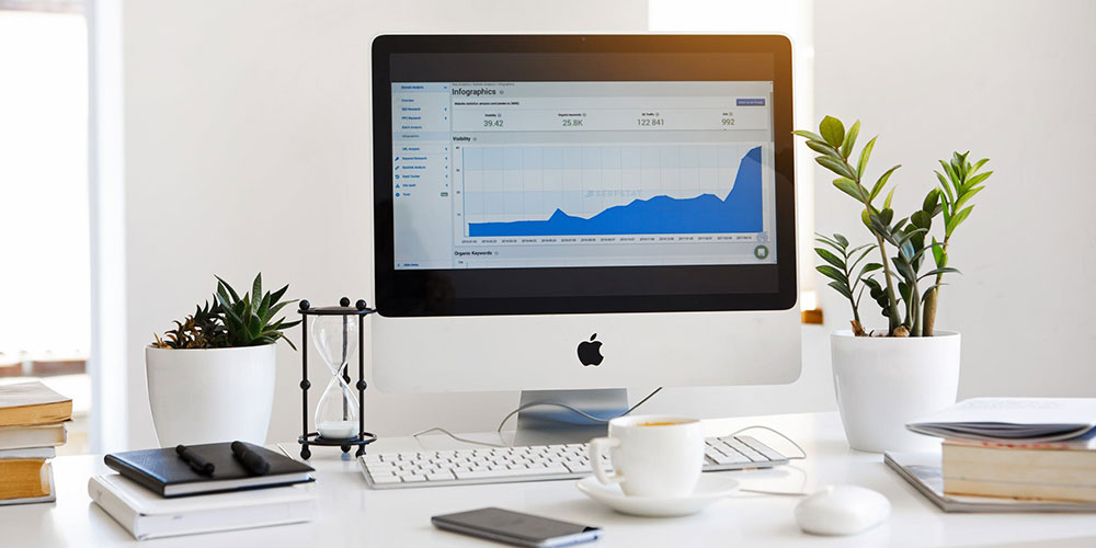 Computer monitor displaying graphs