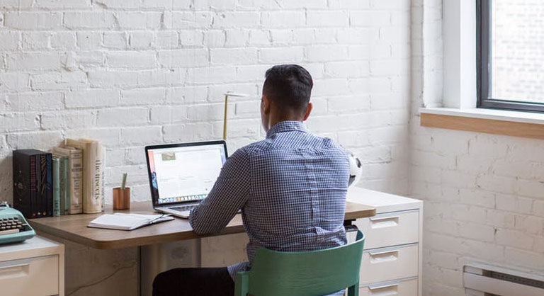 lonely entrepreneur facing wall