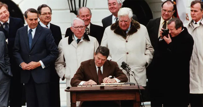 president reagan signing the social security law