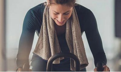 woman using an exercise bike