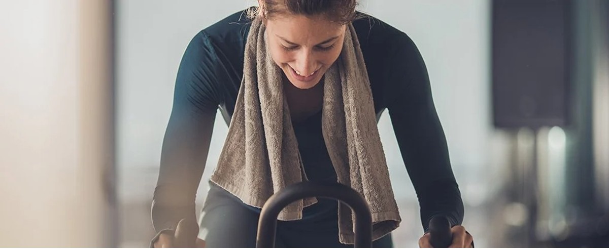 woman using an exercise bike