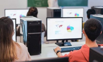 teenagers using computers