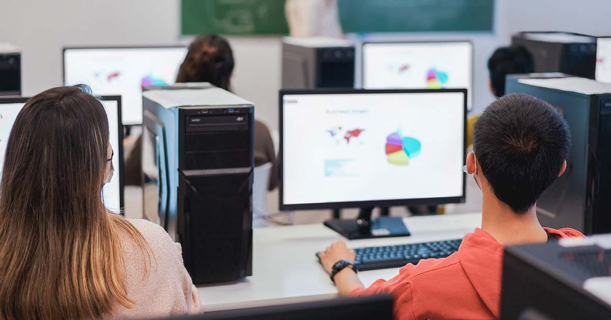 teenagers using computers