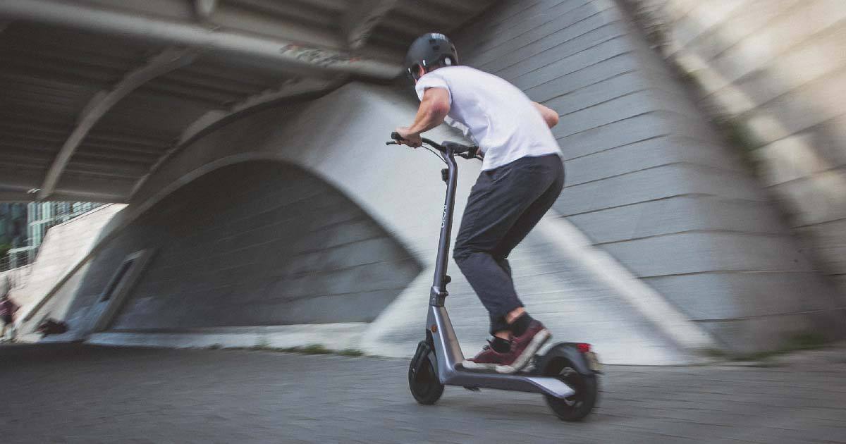 person riding a scooter