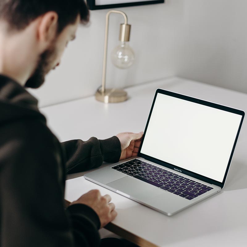 man using a macbook