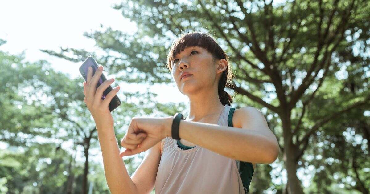 woman holding a phone