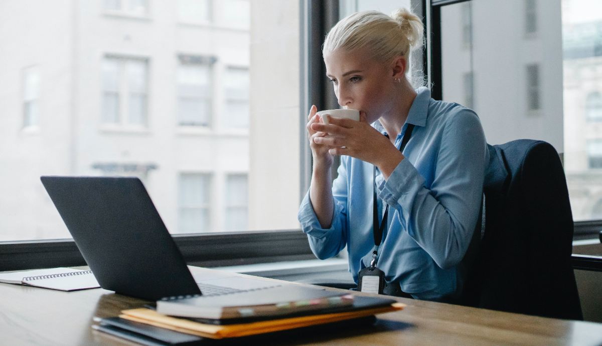 woman looking at her laptop