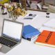laptop and orange notebook