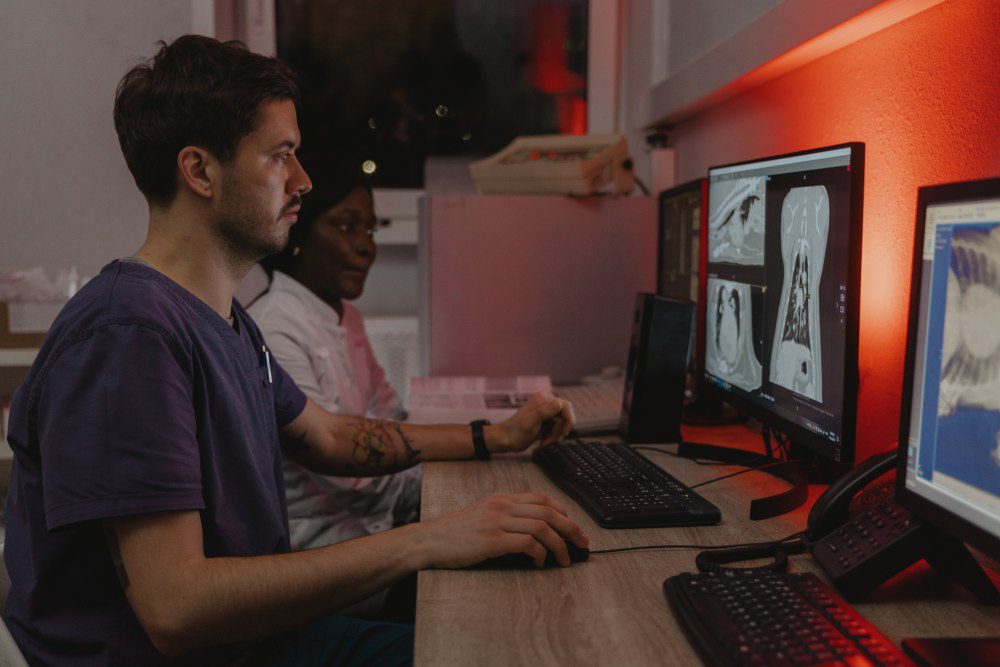 medical professional using a computer