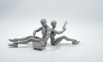 two robots sitting