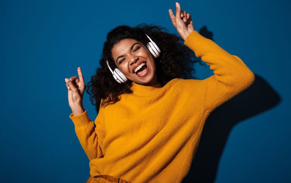 happy woman wearing headphones