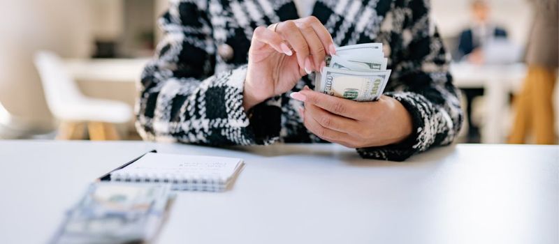 person counting money