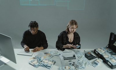 a man and a woman scamming